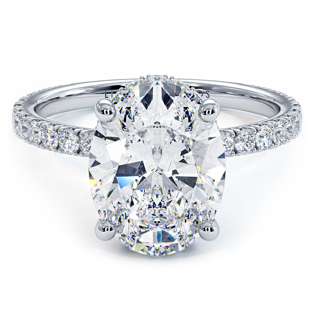 Oval diamond ring with a hidden halo and a pavé band
